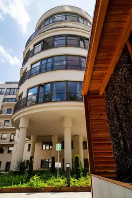 a large building with a round building at Househost Apartment Smoleńsk 33-309A in Kraków