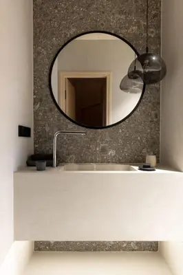 a bathroom with a mirror and a sink at Poczywaj in Jordanów