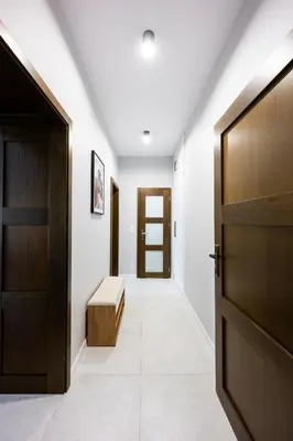 a bedroom with a bed and a mirror at Native Apartments Słowackiego 14/6 Deluxe in Kraków