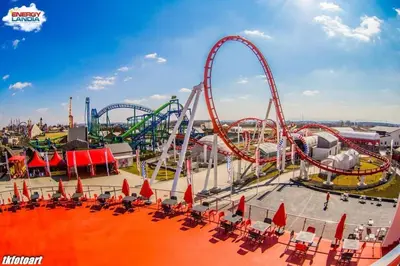 a carnival amusement park with a roller coaster at Bluszcz i Lawenda in Jankowice