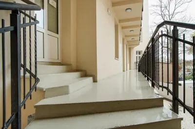 an empty hallway of a building with stairs at Apartment for two-Jewish Quarter-Starowiślna 54 in Kraków