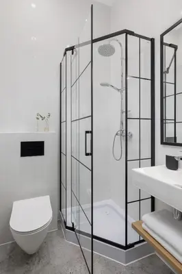 a bathroom with a shower and a toilet and a sink at Apartment with Balcony - 41 Starowislna Street in Kraków