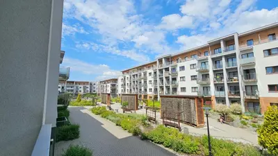 a view of an apartment complex from a window at Apartment Bunscha Park in Kraków