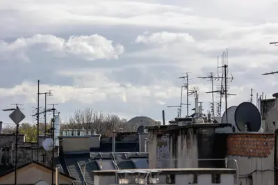 a group of buildings with antennas on top of them at Studio with an AC - Kazimierz - Starowislna 41 in Kraków