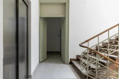 a hallway with a staircase in a building at Studio in Kazimierz District - AC - Starowislna 41 in Kraków