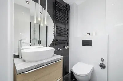 a bathroom with a sink and a toilet at Studio in Kazimierz District - AC - Starowislna 41 in Kraków