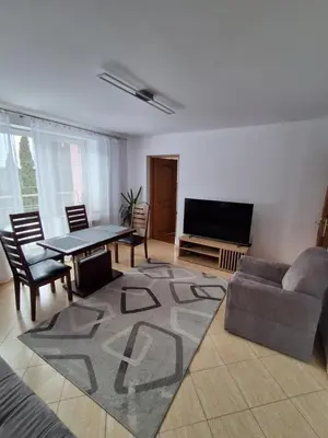 a living room with a couch and a table at House in Zabierzów in Zabierzów