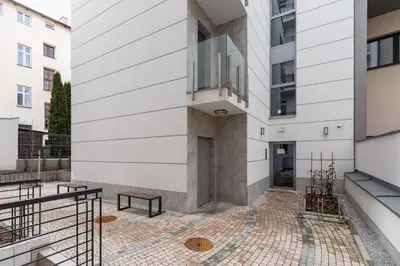 an external view of a building with a courtyard at Studio apartment - Rakowicka 14 Street in Kraków
