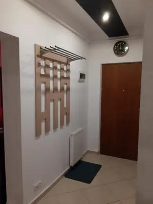 a room with a door and a wall at Apartament Kantego in Olkusz