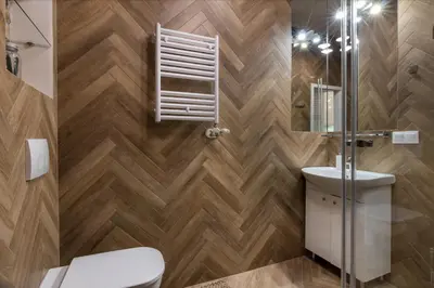 a bathroom with a toilet and a shower at Studio apartment - Centre of Kraków - Starowiślna 54 in Kraków