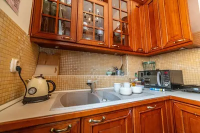 a kitchen with a sink and a microwave at Climatic studio for 2-4 person in Main Square in Kraków
