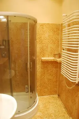 a bathroom with a shower and a sink at Climatic studio for 2-4 person in Main Square in Kraków