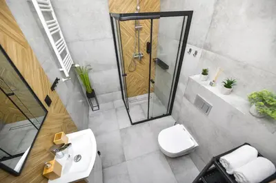 an overhead view of a bathroom with a shower and a toilet at Moonlight by Housine in Zator