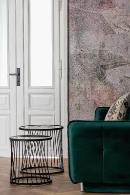 a living room with a green couch and two tables at 3 Bedroom Apartment - Dietla 11 in Kraków