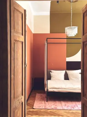 an open door to a bedroom with a bunk bed at Quiet Luxury on Floriańska in Kraków