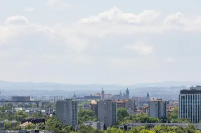 a view of a city with tall buildings at Gamers' Paradise - Modern Apartment with Parking in Cracow by Noclegi Renters in Kraków