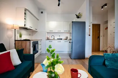 a living room with a couch and a table at Dolce Vita by Housine in Zator