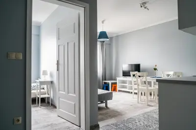 an open door to a kitchen and a living room at Apartament Róża 2 Zator - 2km od Energylandii in Zator