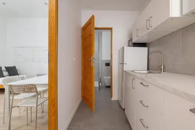 a bedroom with two beds and a window at 3-bedroom apartment - 51 Dietla street in Kraków