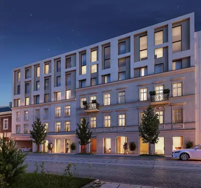 a large building with a car parked in front of it at Wawel View Stylish Apartment - Kościuszki 22 in Kraków