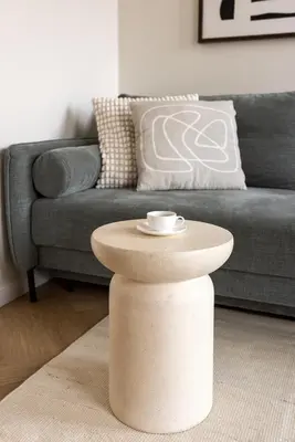 a coffee table in a living room with a couch at Wawel View Stylish Apartment - Kościuszki 22 in Kraków