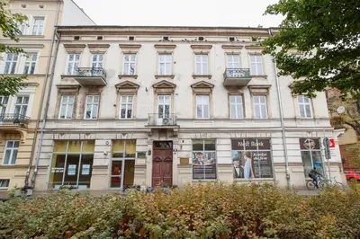 an old building in the center of a city at Apartment with City View - Dietla 68 street in Kraków