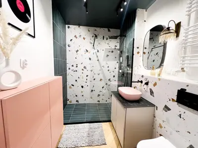 a bathroom with a pink sink and a shower at Charming Apartment in a green area- free parking in Kraków