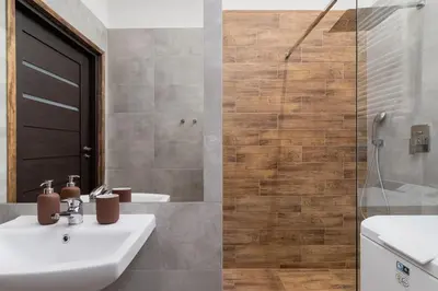a bathroom with a sink and a shower at Entire apartment in Kraków, Poland in Kraków