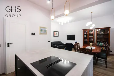 a kitchen and living room with a dining room at Royal university apartment, Wawel castle in Kraków