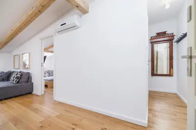 a living room with a couch and a table at 2 bedroom Apartment with terrace- Piłsudskiego 11 in Kraków