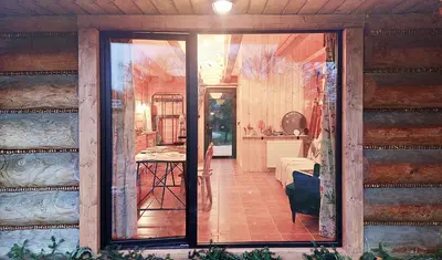 an open door of a house with a room at Pod lasem i niebem in Lanckorona