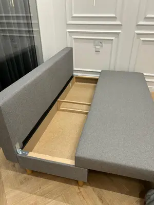 a bed sitting on the floor in a room at Vintage Charm in Old Town Krakow Józefa Sarego apt A in Kraków