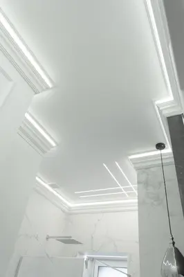 a ceiling with a large light in a bathroom at Vintage Charm in Old Town Krakow Józefa Sarego apt A in Kraków