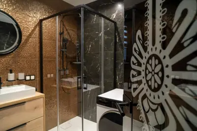 a bathroom with a shower and a sink at Władysławka in Rabka-Zdroj