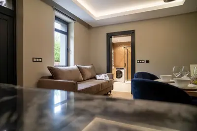 a living room with a couch and a table at Władysławka in Rabka-Zdroj