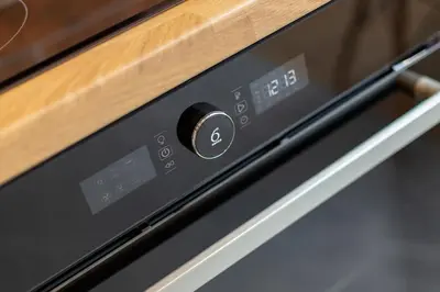 a close up of a oven with a control panel at Modern Apartment in Kazimierz District - Józefa 2 in Kraków