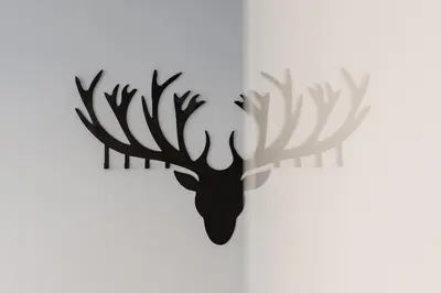 a wall mounted stag head with antlers at Modern Apartment in Kazimierz District - Józefa 2 in Kraków