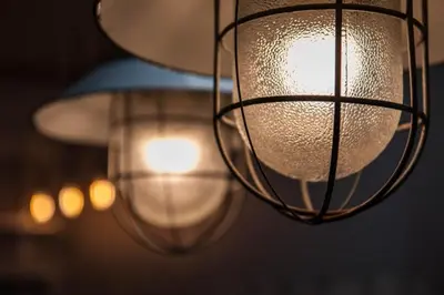 a close up of a hanging light fixture at Studio for two with an AC - Dietla 51 street in Kraków