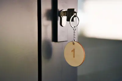 a door key chain with a number one on it at Nadwiślańska Apartments - Lipowa, 11km od Zator, Energylandia in Zator