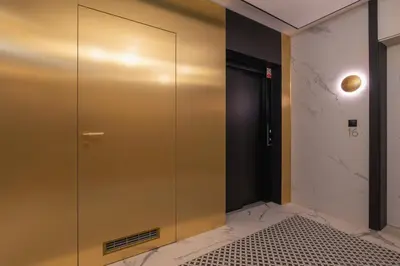 a elevator in a room with a door at Krowoderska Apartment with Balcony near City Center by Rent like home in Kraków