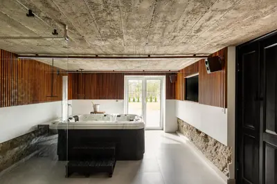 a bathroom with a large sink and a large window at House for 20 people with a private SPA and bar Koma House in Sidzina