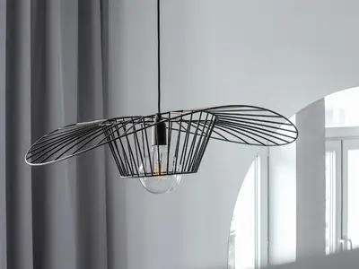 a black chandelier in a room with a window at City center - Radziwiłłowska 27 in Kraków
