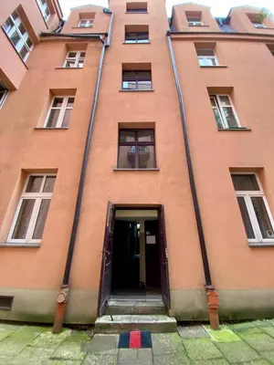 a bathroom with a toilet and a sink and a shower at Starowiślna 66 in Kraków