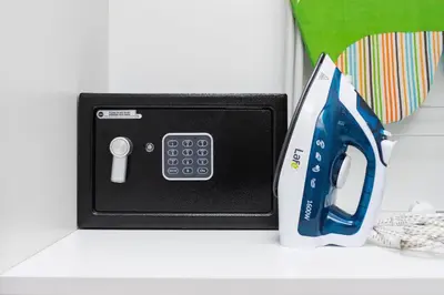 a small box with a pair of scissors on a counter at Apartment for two - Piłsudskiego 1 Street in Kraków