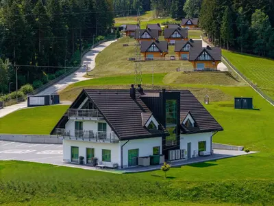 an overhead view of a house on a hill at Kompleks Gazdówka - Dom Jana in Ponice