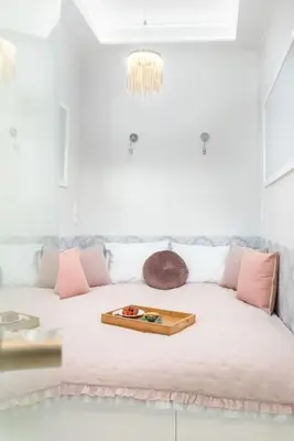 a bed with a tray on top of it at 1 - bedroom Apartment - Plac na Groblach 19 in Kraków