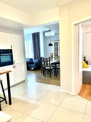 a living room with a kitchen and a dining room at Sonja in Zator