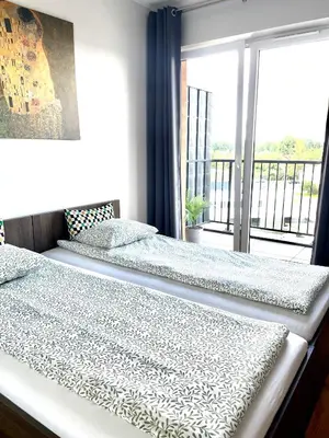 a bed in a room with a large window at Sonja in Zator