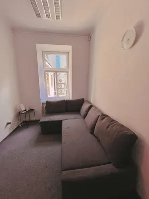 an empty room with a white closet and a picture on a dresser at Cool and big room in Krakow in Kraków