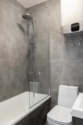 a bathroom with a shower and a toilet at Zyblikiewicza 5- Studio Apartment- Old Town in Kraków
